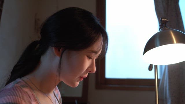 Woman enjoying a meal indoors