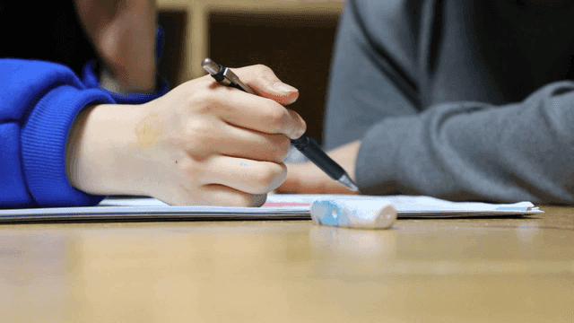 Students studying together at a table