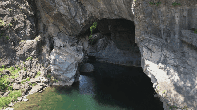 River flowing through quiet cave