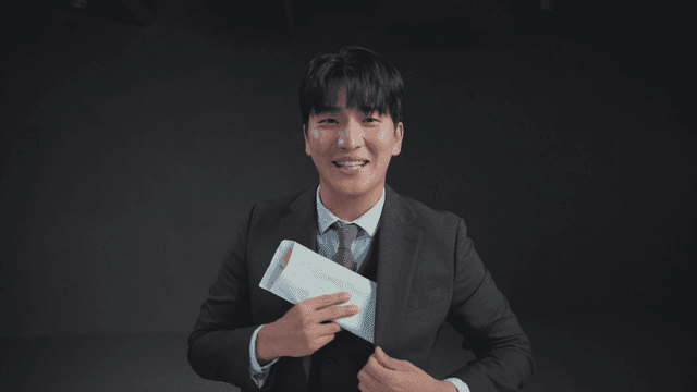 Man receiving an envelope of money