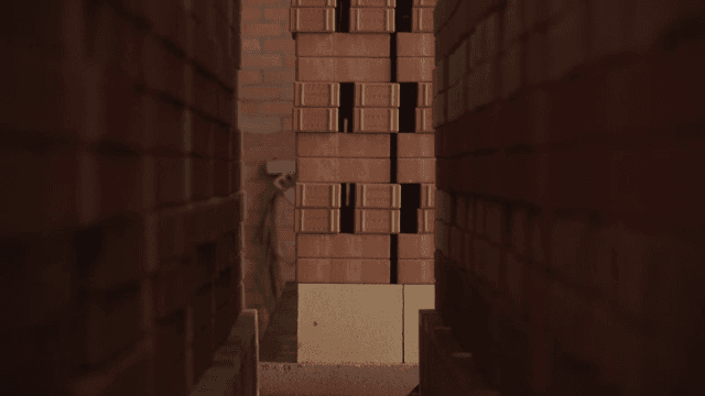 Stacks of bricks in a factory setting