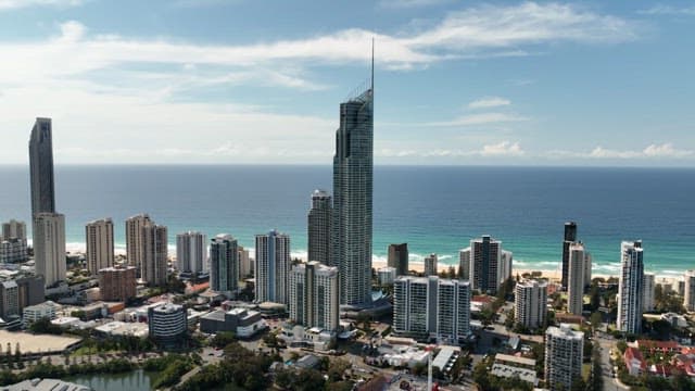 Coastal Cityscape with Skyscrapers and Sea