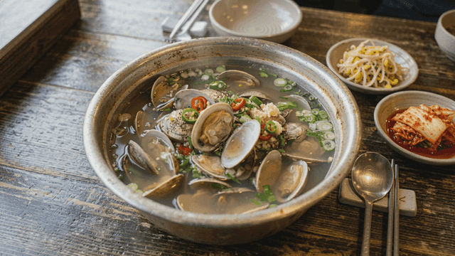 Clam soup served with side dishes
