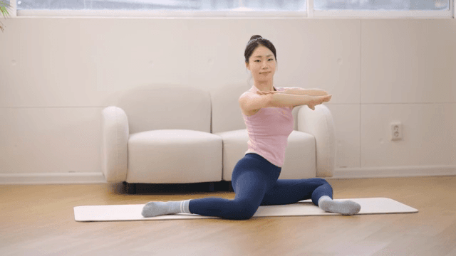 Woman exercising indoors