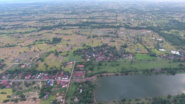 View of rural farmland and village