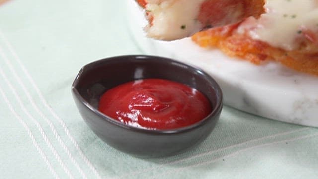 Cheese Potato Pancakes Dipped in Ketchup