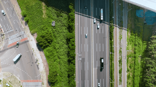 Highway with vehicles and greenery