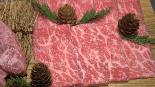Marbled beef on a wooden board