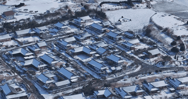 Snow-covered traditional Hanok village