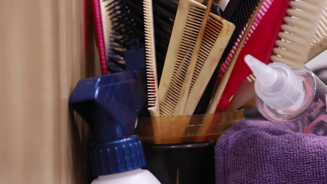 Beauty salon with a variety of combs and hair products