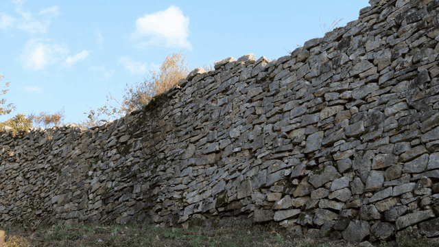 Stone wall under clear sky