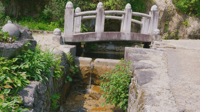 Creek with small stone bridge