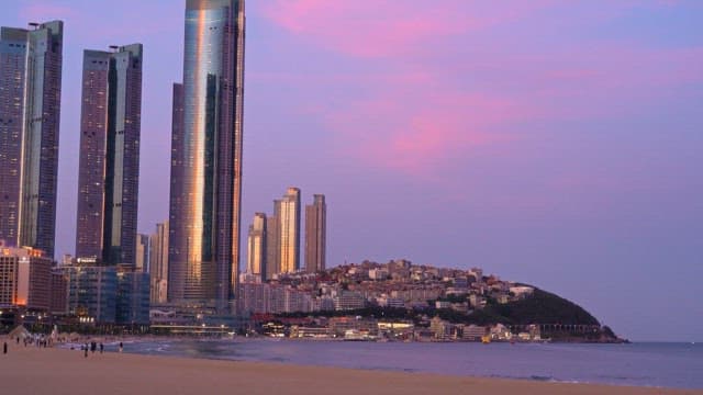 City Skyline and Beach at Dusk