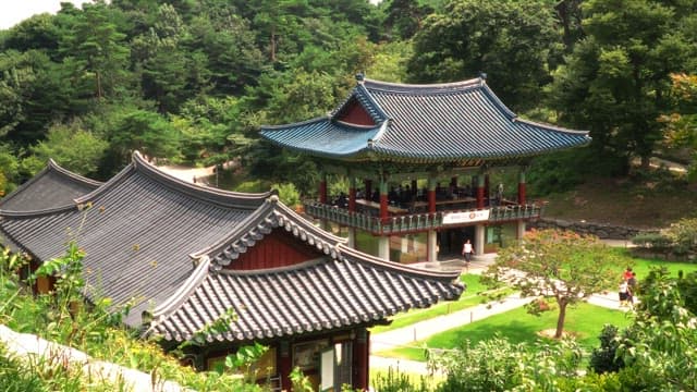 Traditional Korean temple in lush greenery