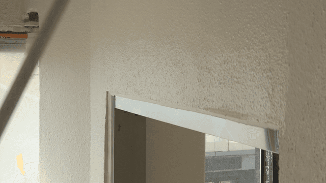 Roller brush painting on a wall