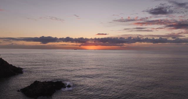 Vast sea bathed in dusk