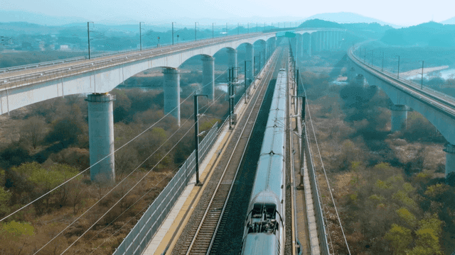 High-speed train on elevated tracks