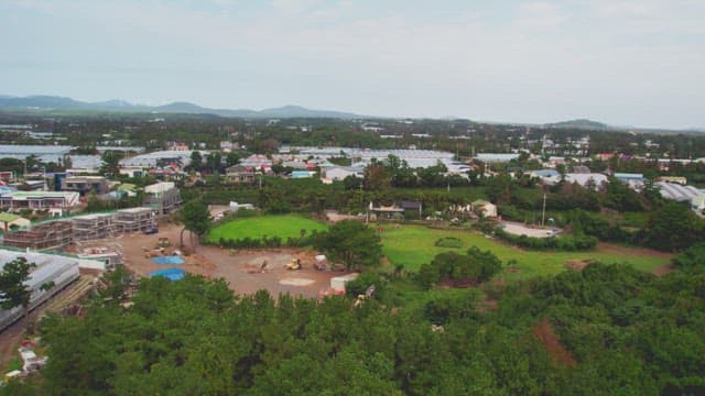 Scenic view of a rural village with greenery