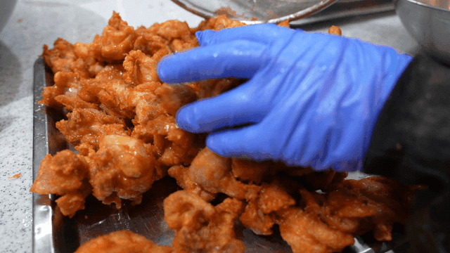 Freshly fried chicken on tray