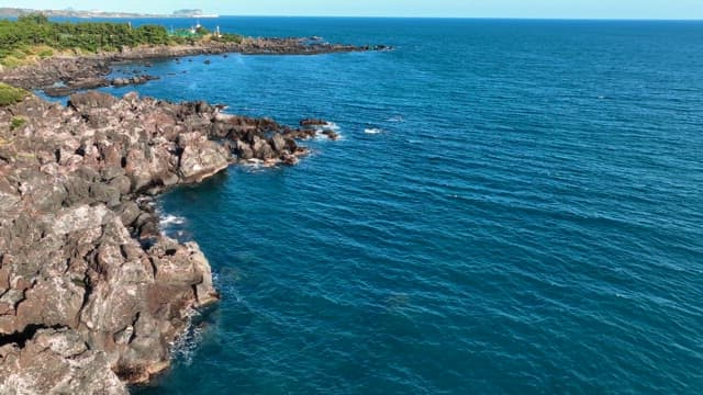 Rocky coastline with clear blue sea