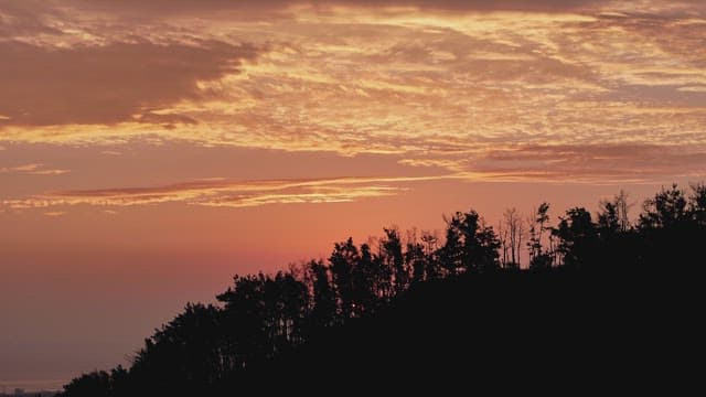 Serene coastal landscape at sunset