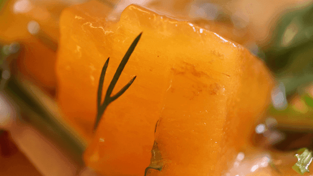 Close-up of fresh, yellow persimmons