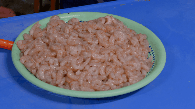 Basket full of fresh shrimp meat