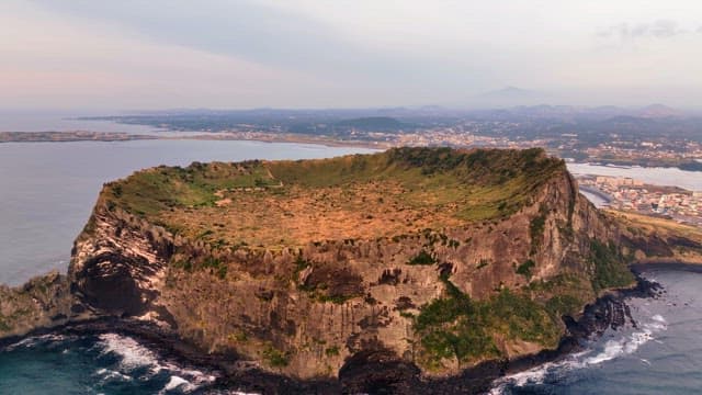 Volcanic island with a crater and ocean