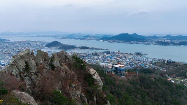 Panoramic view of a city and mountains