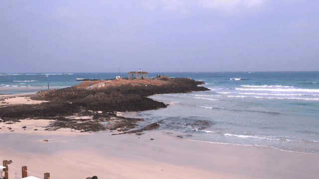Quiet beach with gentle waves