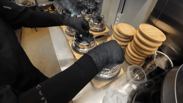 Chef preparing dishes in a busy kitchen