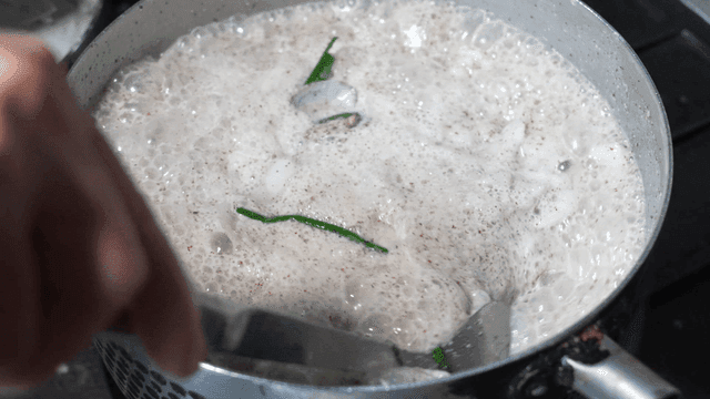 Hot perilla leaf handmade dumplings stirred with ladle