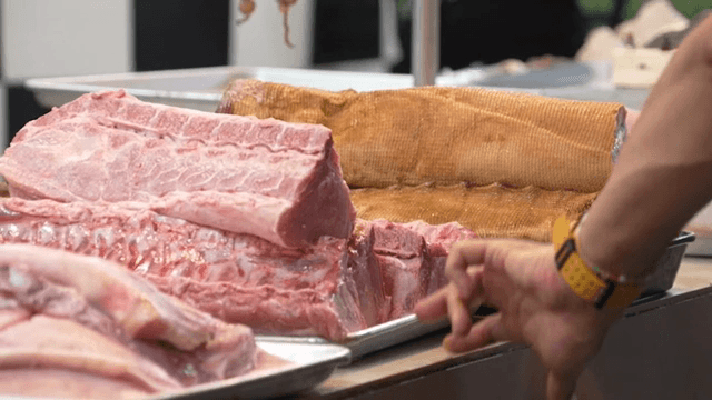 Fresh meat displayed on a market counter