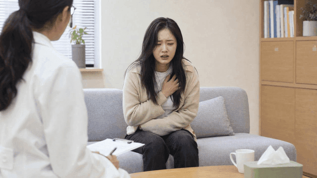 Painful woman consulting doctor