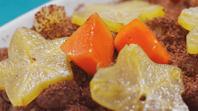 Cocoa cream dessert decorated with fruit