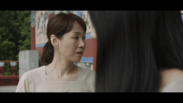 Woman glaring at someone