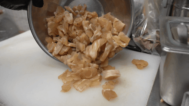 Beef tendons pouring out of bowl