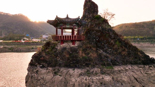 Traditional pavilion on a rocky cliff