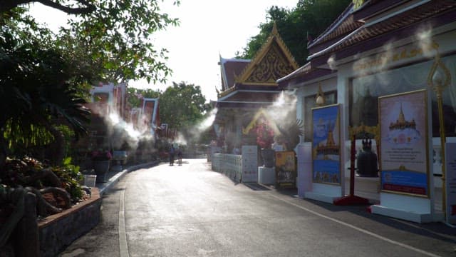 Buildings and fog on the way to the temple