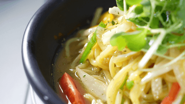 Bowl of jjamppong soup with vegetables