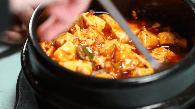 Spicy Mapo Tofu Stirring in Pot