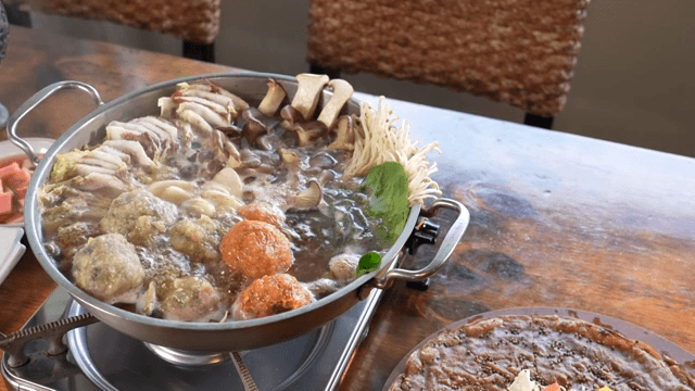 A pot of Korean hot pot with various ingredients