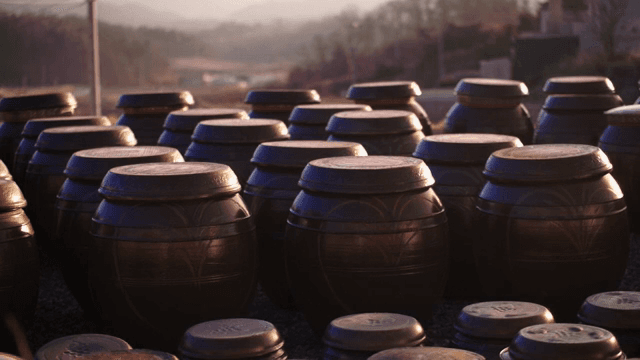 Traditional Korean jars in sunlight