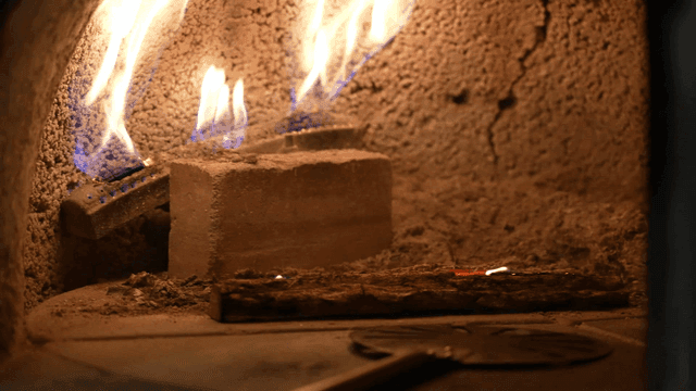 Flames inside a traditional oven