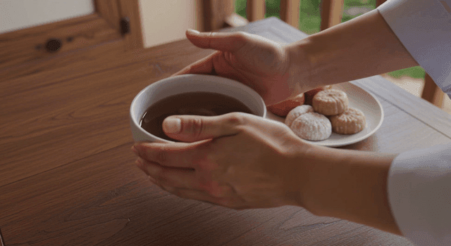 Traditional Korean tea and snacks on a table