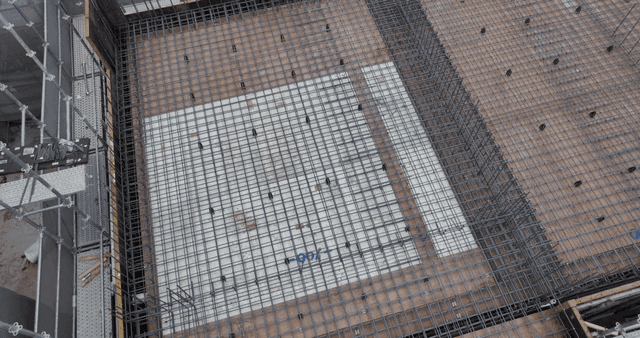 Construction site with materials and scaffolding