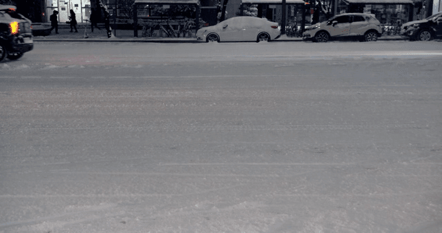 Vehicles passing on snow-covered roads