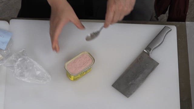 Preparing Canned Ham on a Cutting Board