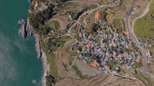 Coastal village with the sea and rice fields spread out