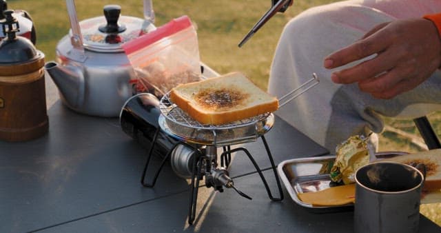 Preparing a Toasted Sandwich Outdoors